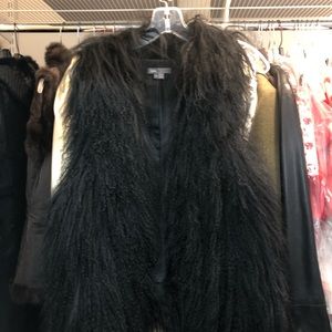 VINCE Mongolian Vest with leather trim. Black. EUC